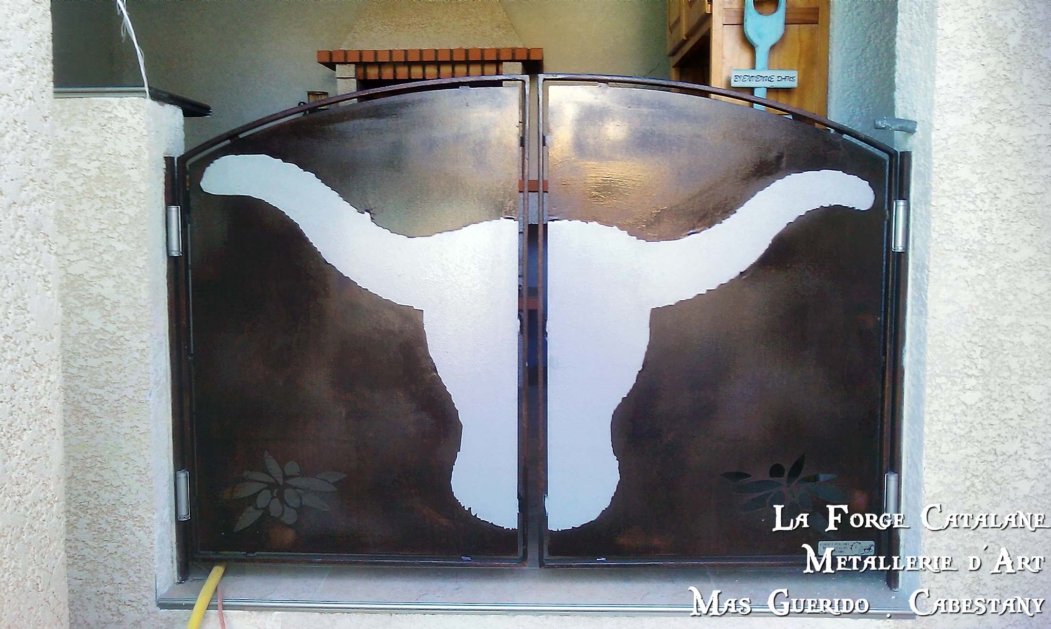 Portail  2 vantaux en decoupe laser forge catalane.jpg